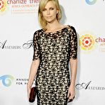 Third pic of Charlize Theron posing for paparqazzi shows legs