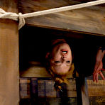 Second pic of SexPreviews - Madison Young redhead in severe rope bondage and suspension is toyed