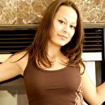 Fourth pic of Hotty Stop / Daisy poses in a tight tanktop and a tiny little thong showing off her amazing teen ass