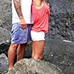 Second pic of Audrina Patridge shows deep cleavage in green bikini when relaxing on a tropical vacation