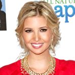 Third pic of Ivanka Trump in red dress posing for paparaqzzi