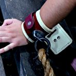 Second pic of SexPreviews - Sasha dungeon bound in cage with tits clamped wondering what is coming next