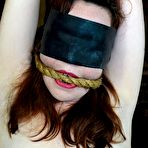 Third pic of SexPreviews - Maggie Mead rope bound on high heels and stockings her mouth spread