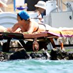 Fourth pic of Manuela Arcuri caught in bikini on the beach in Italy