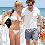 Third pic of Michelle Hunziker sexy in white bikini on the beach in Miami