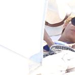 Fourth pic of Nicole Richie in blue bikini on the beach candids