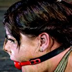 Second pic of SexPreviews - Mia Gold rope bound with red ballgag her body spanked red with single tail