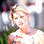 Second pic of Tara Reid shows deep cleavage in green bikini