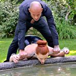 Second pic of Sex Previews - Isabel Dean bound submissive in black latex spanked and humiliated outdoors by maledom