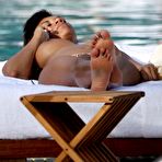 Second pic of Busty Georgette Eto`o caught topless on the beach