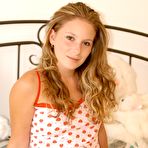 First pic of Christie Lee - Smoking hot blonde gal Christie Lee strips on the bed and plays with her hungry cunt.