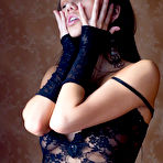 Third pic of Diva A - Diva A strips her sexy black lace lingerie off and then fingers her shaved vagina.