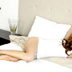 First pic of Eufrat - Busty blonde vixen Eufrat strips on the bed and passionate fingers her shaved muff.