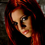 First pic of Gabrielle Lupin - Smoking hot redhead babe Gabrielle Lupin takes off her shirt and exposes her rack.