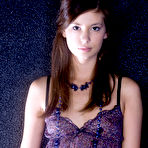 First pic of Irina J - Irina J takes her cute purple dress off and teases us in sexy white stockings.