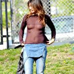 Fourth pic of Rosy Dilettuso sunbathing topless in the park