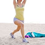 Fourth pic of Chyler Leigh doing yoga on the beach