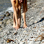 Third pic of Julia I - Julia I strips her sexy bikni off on the beach and shows us her amazing tight ass.