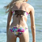 Second pic of Candice Swanepoel in bikini on a beach & yacht