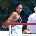 Third pic of Michelle Rodriguez in black bikini poolside shots