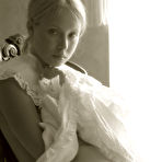 Fourth pic of Koika - Koika takes her vintage clothes off and teases us in sexy stockings on the chair.