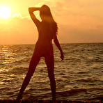Fourth pic of Nastya A - Nastya A spends her days on the beach to pose on camera and to make many photos.