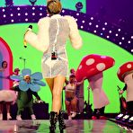 Fourth pic of Miley Cyrus without bra under fishnet dress