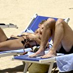 First pic of Louise Nurding flashes her nude boobs on the beach