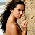 Second pic of Olga M - Olga M takes all of her clothes off outdoors on the beach and shows her hot ass.