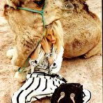 Third pic of Natasha Poly sexy and  topless posing scans from mags