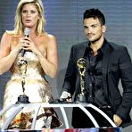 Fourth pic of Rachel Hunter posing for paparazzi, shows her legs in Monte Carlo