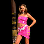 First pic of Roxy Carter - Sluty brunette Roxy Carter with sexy tanned ass taking pink tight skirt and posing