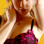 First pic of Veronika Fasterova - Classy blonde babe Veronika Fasterova teases us in purple lingerie and stockings.