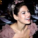 Third pic of Eva Mendes posing for paparazi in long night dress at 2011 Art of Elysium Heaven Gala