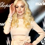 Second pic of Lindsay Lohan posing for paparazzi in night dress