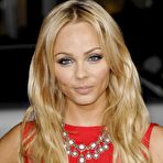 Third pic of Laura Vandervoort in short red dresses shows her legs