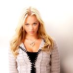 Third pic of Laura Vandervoort posing sexy, shows her legs