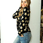 First pic of Carmen Electra non nude posing ib various apartments photoshoots