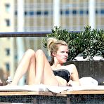 Second pic of Busty Brooklyn Decker poolside in bikini candids