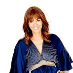 Third pic of Halle Berry posing in jeans and blue top photoset