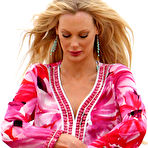 First pic of Busty Sophie Turner shows deep cleavage on the beach