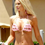 Fourth pic of Busty Sophie Turner shows deep cleavage on the beach