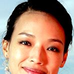 Third pic of Shu Qi non nude posing photoshoot