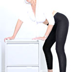 Third pic of Mature good looker Lady Sonia in leggings and shoes plays with her round melons