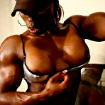 Second pic of Big black Female Bodybuilder topless workout