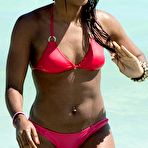 First pic of Alexandra Burke in red bikinie on the beach