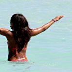 Third pic of Alexandra Burke in red bikinie on the beach