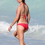 Second pic of Anne Vyalitsyna side of boob in red bikini