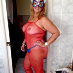 Fourth pic of My sexy wife for your enjoyment BBW in fishnets