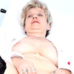 Third pic of Older nurse Ruzena gaping her untidy vulva wide